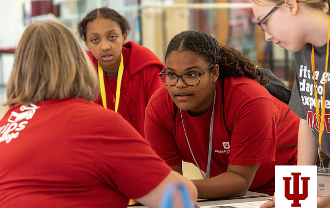 A group of people in red shirts