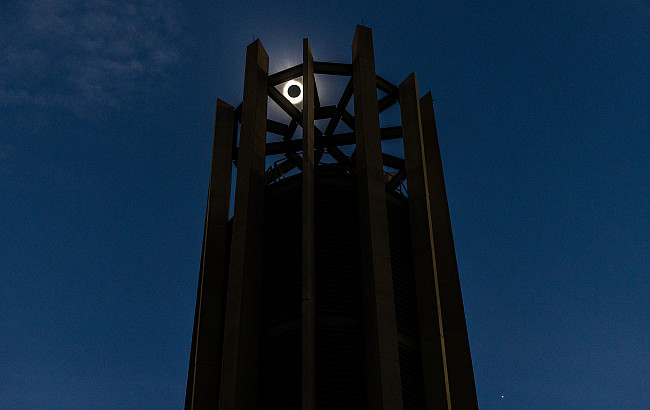 Total solar eclipse through a carillon on Bloomington campus