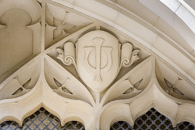 A limestone carving of the Indiana University trident adorns an entryway at the Biology Building at IU Bloomington.