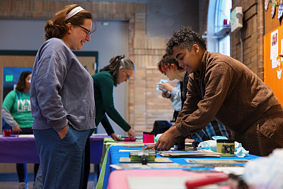 Attendees check-in to the Spirit & Place Festival opening event