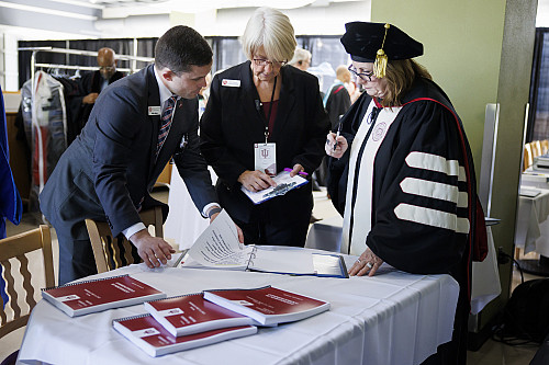 Preparations require attention to detail. Indiana University Executive Director of Events Mike Santa, left, IU Associate Director of Univ...