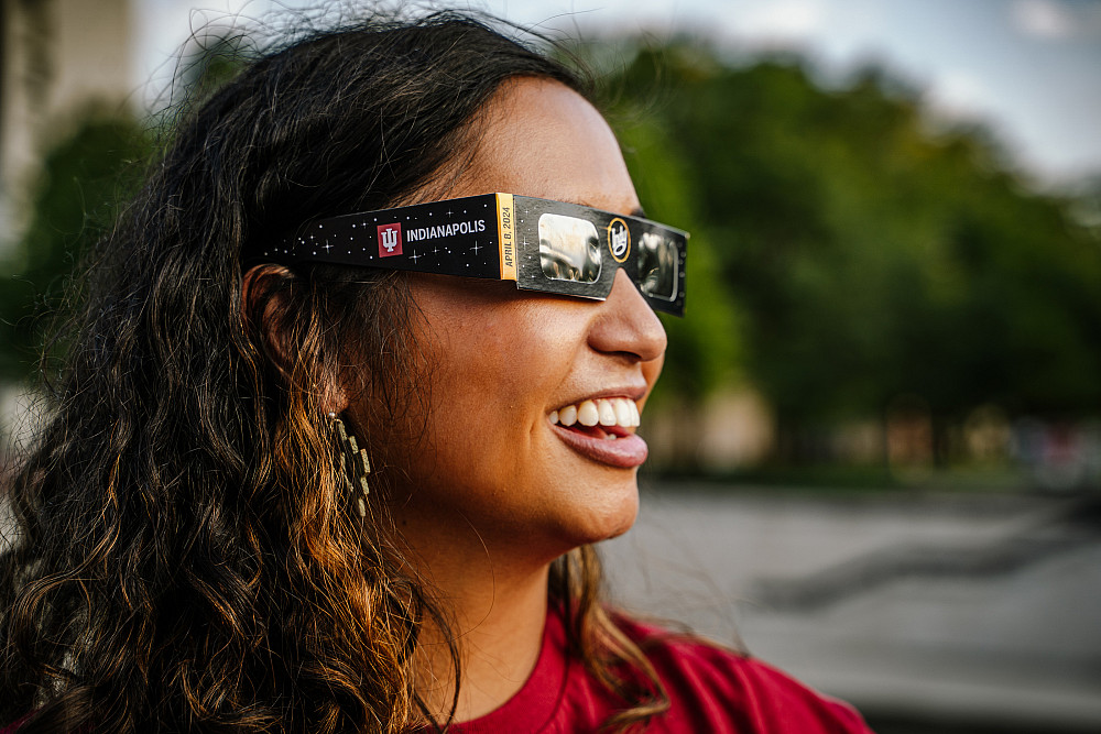 Marketing photo shoot featuring Indiana University Indianapolis branded eclipse-viewing glasses in downtown Indianapolis on Monday, Sept....