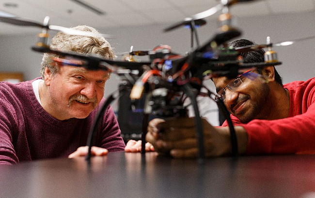 IUPUI faculty member and student work together in lab