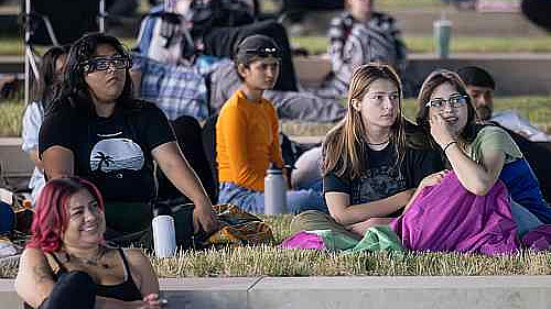 Moviegoers gather on the back lawn of the IU Hamilton Lugar School on June 9, 2023. Photo by Andrew Russell, Division of Student Affairs