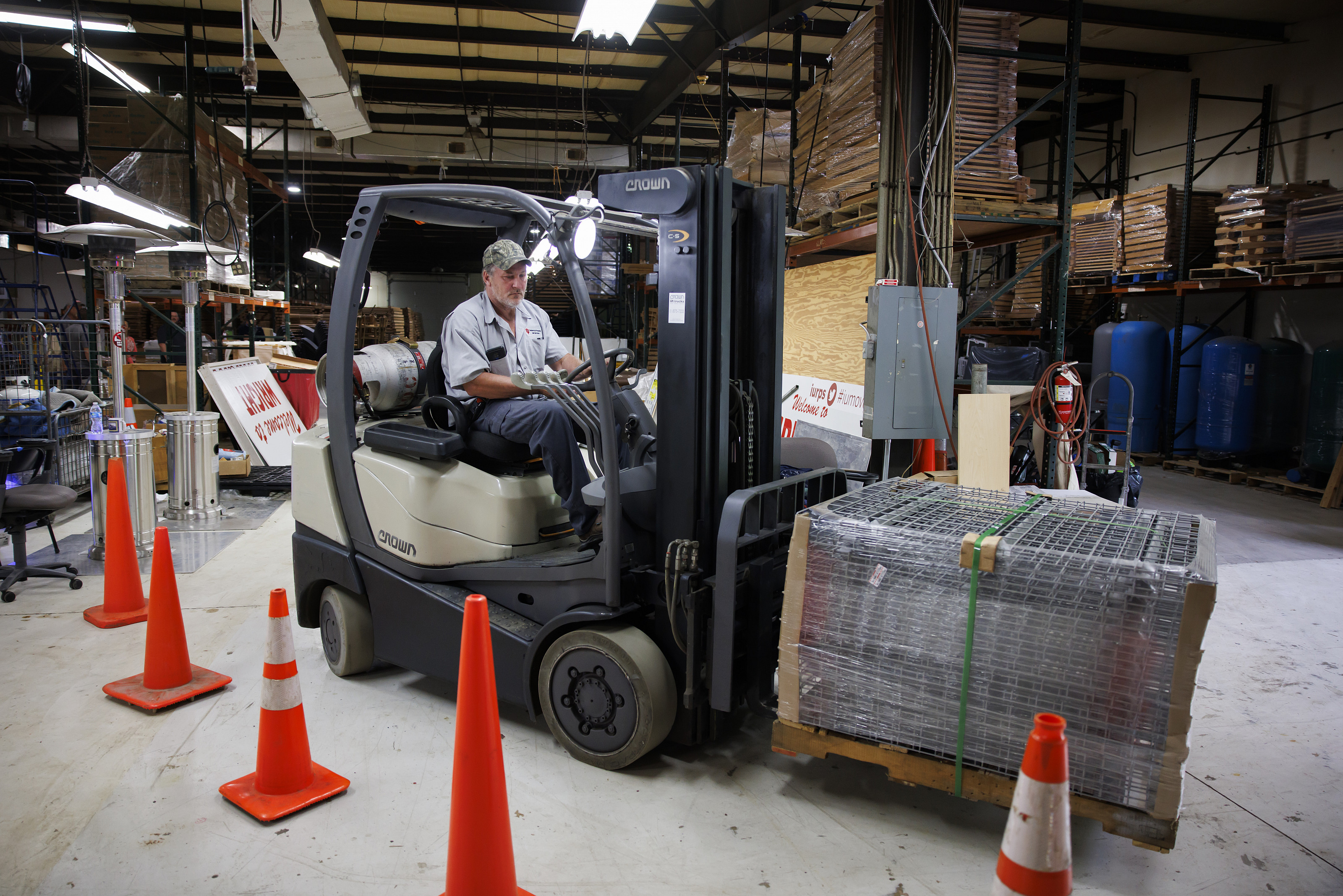 Indiana University Housing worker Steven Arthur navigates an obstacle course using a loaded fork lift during a Environmental Health and S...