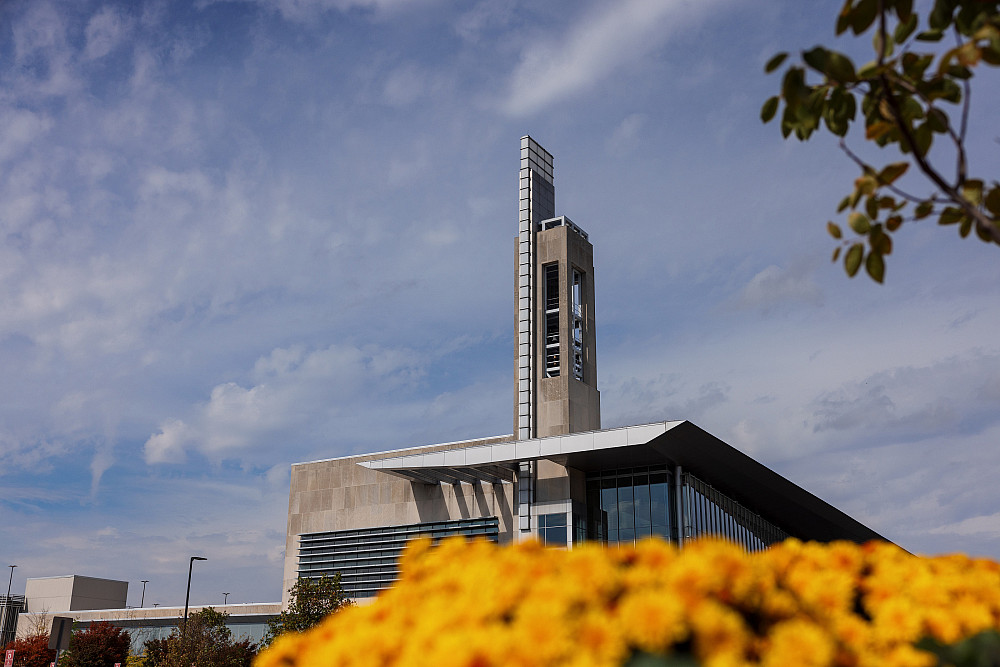 Fall foliage frames the Campus Center bell tower at IUPUI. The photo was taken on Wednesday, Oct. 18, 2023. (Photo by Liz Kaye/Indiana Un...
