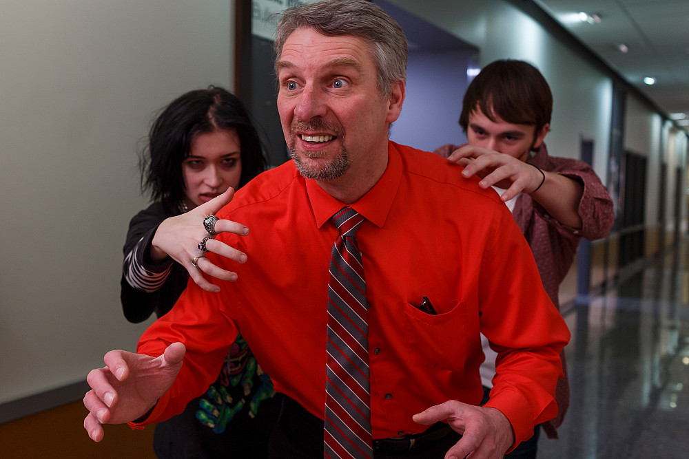Thomas Duszynski and student in Fairbanks School of Public Health enact a zombie apocalypse, February 10, 2020. Photo by Liz Kaye