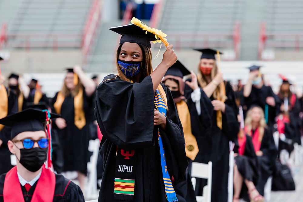 Khrisma McMurray celebrates during the commencement ceremony at Carroll Stadium.