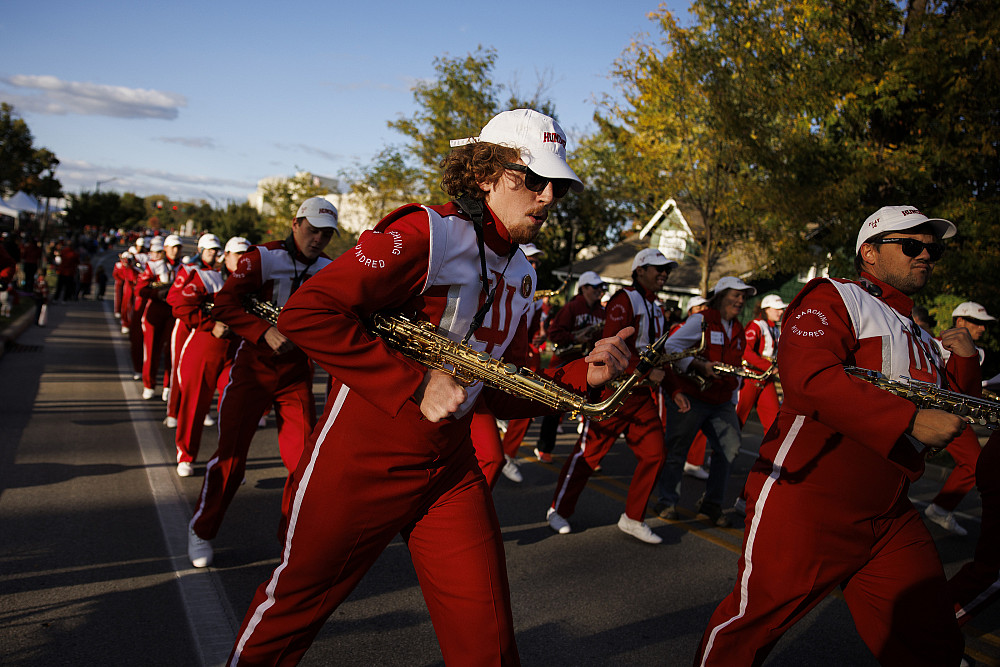 Members of the Indiana University Marching Hundred perform during the IU Bloomington Homecoming Parade on Friday, Oct. 7, 2022. Photo by ...