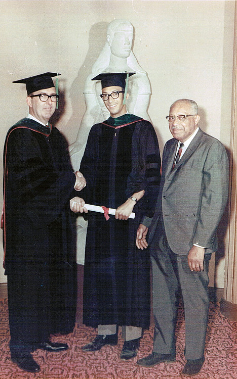 Lester W. Thompson, center, receives his medical degree in 1968 from Indiana University, with his proud father at right. Photo courtesy o...