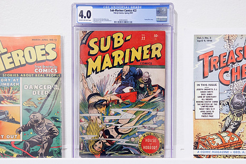 Comic books including Sub-Mariner Comics #22 (1947) are pictured on display as part of The Deep End: Golden Age Comic Books in the Grunwa...