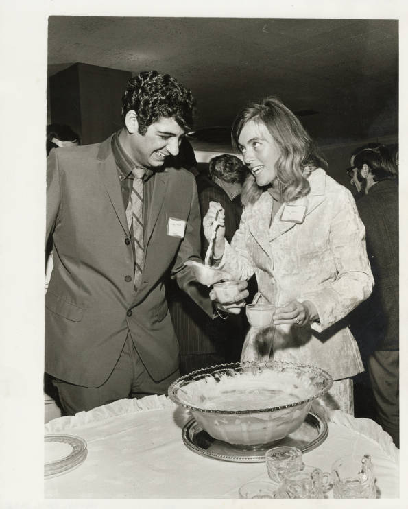 Aziz Majid and Mrs. B. Larry Pedlar at campus event, ca. 1970