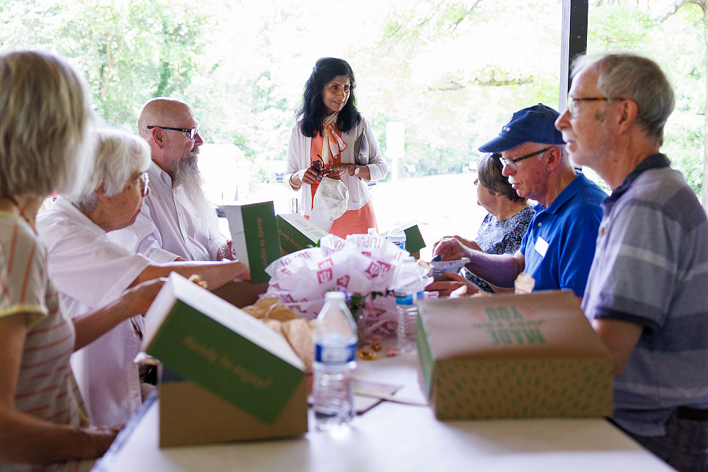 Latha Ramchand, center, talks to Senior Academy members at Eagle Creek Park