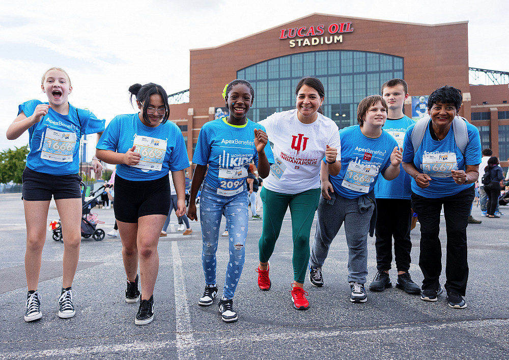 Monumental Kids 5K participants outside of Lucas Oil Stadium