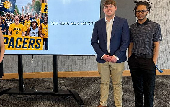 Four students present their Pacers game day experience idea